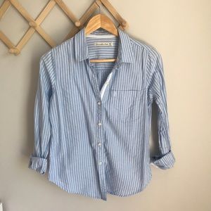 Women’s long sleeve blue striped button up shirt